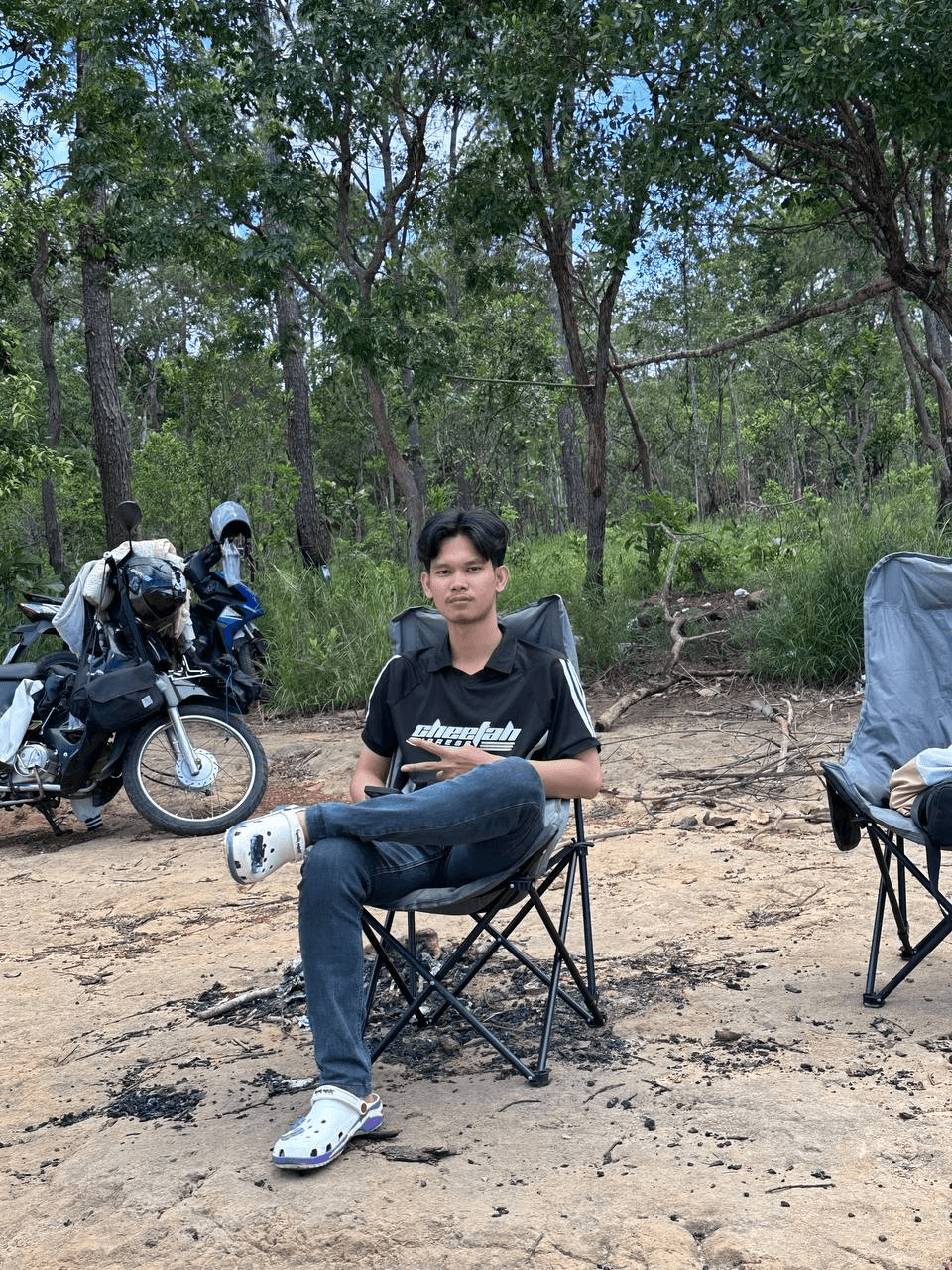 SOKNA CHUN relaxing at a campsite in Kirirom